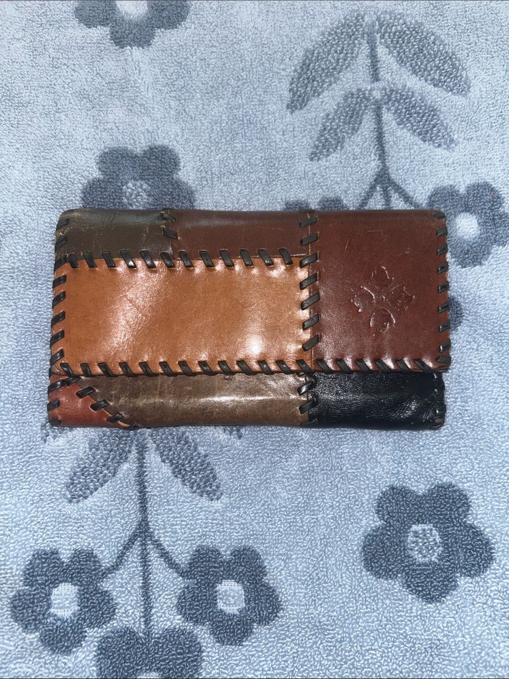 Vintage handmade, Italian leather trifold wallet. Made by Patricia Nash.